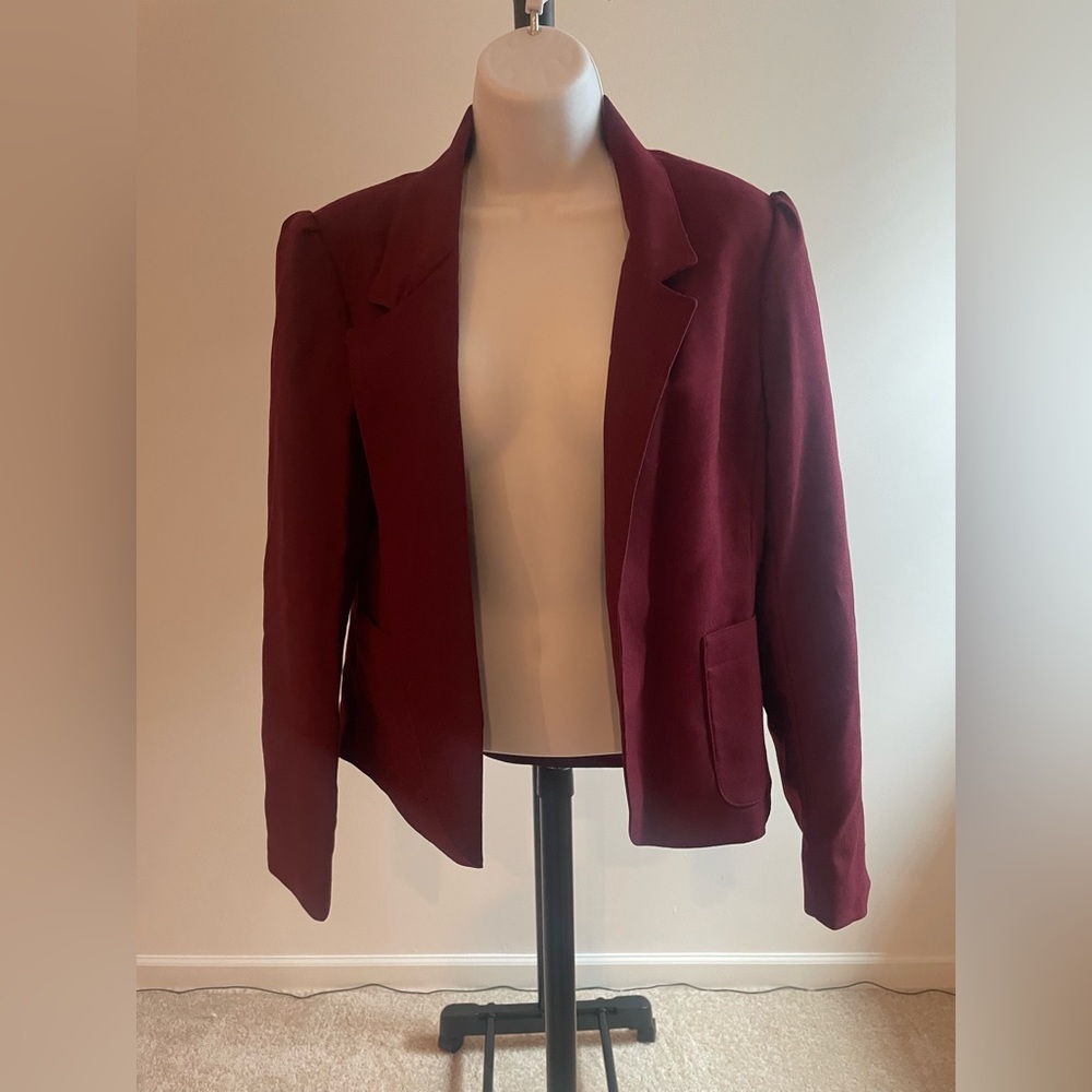Beautiful Burgundy blazer.. can go with anything! Size 10